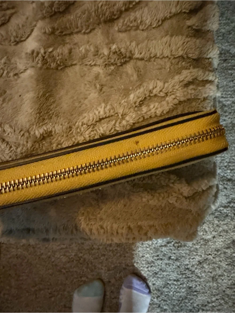 kate spade pebbled yellow zip-around wallet